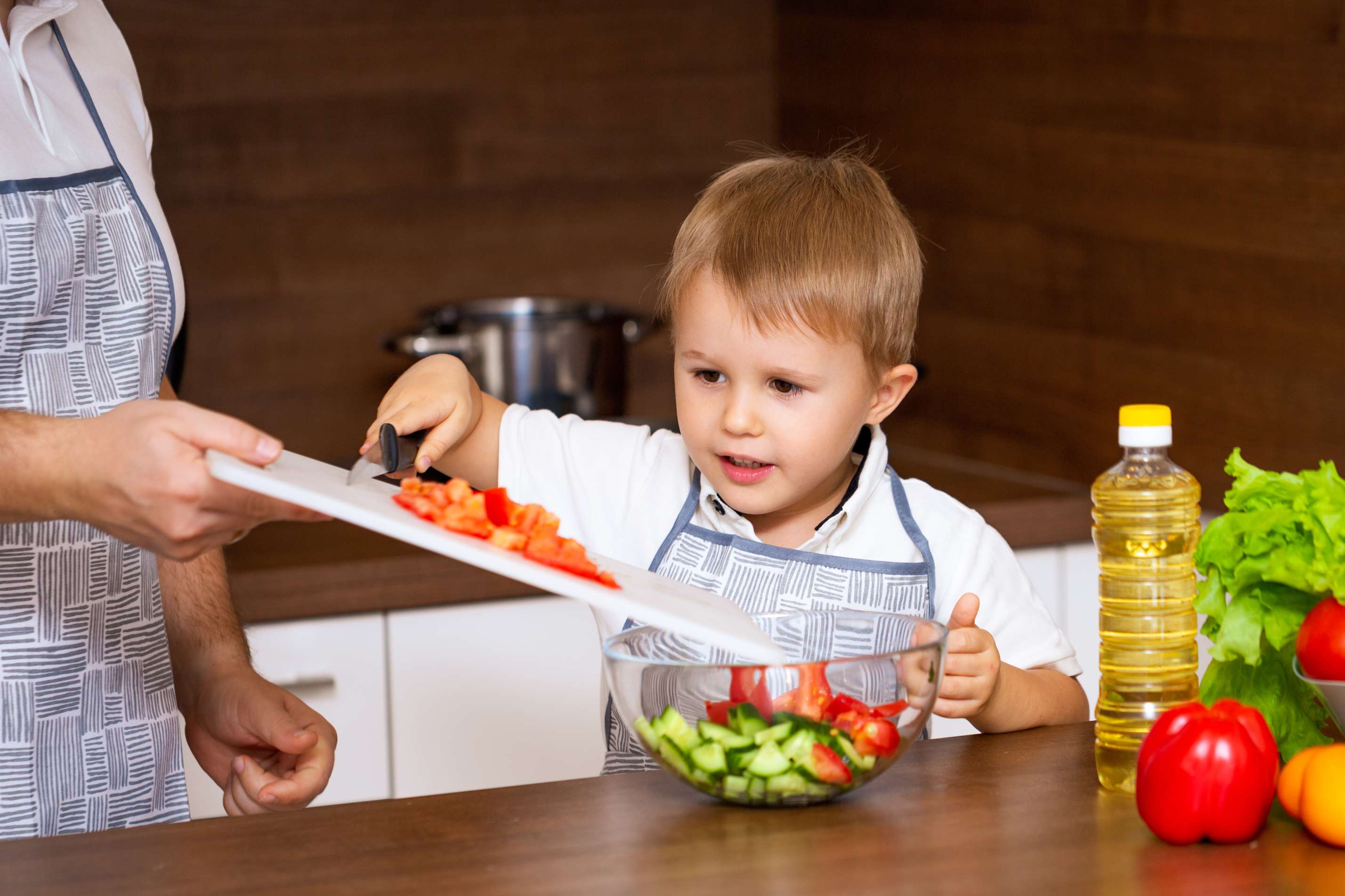 Children enjoying a healthy snack together at small tables