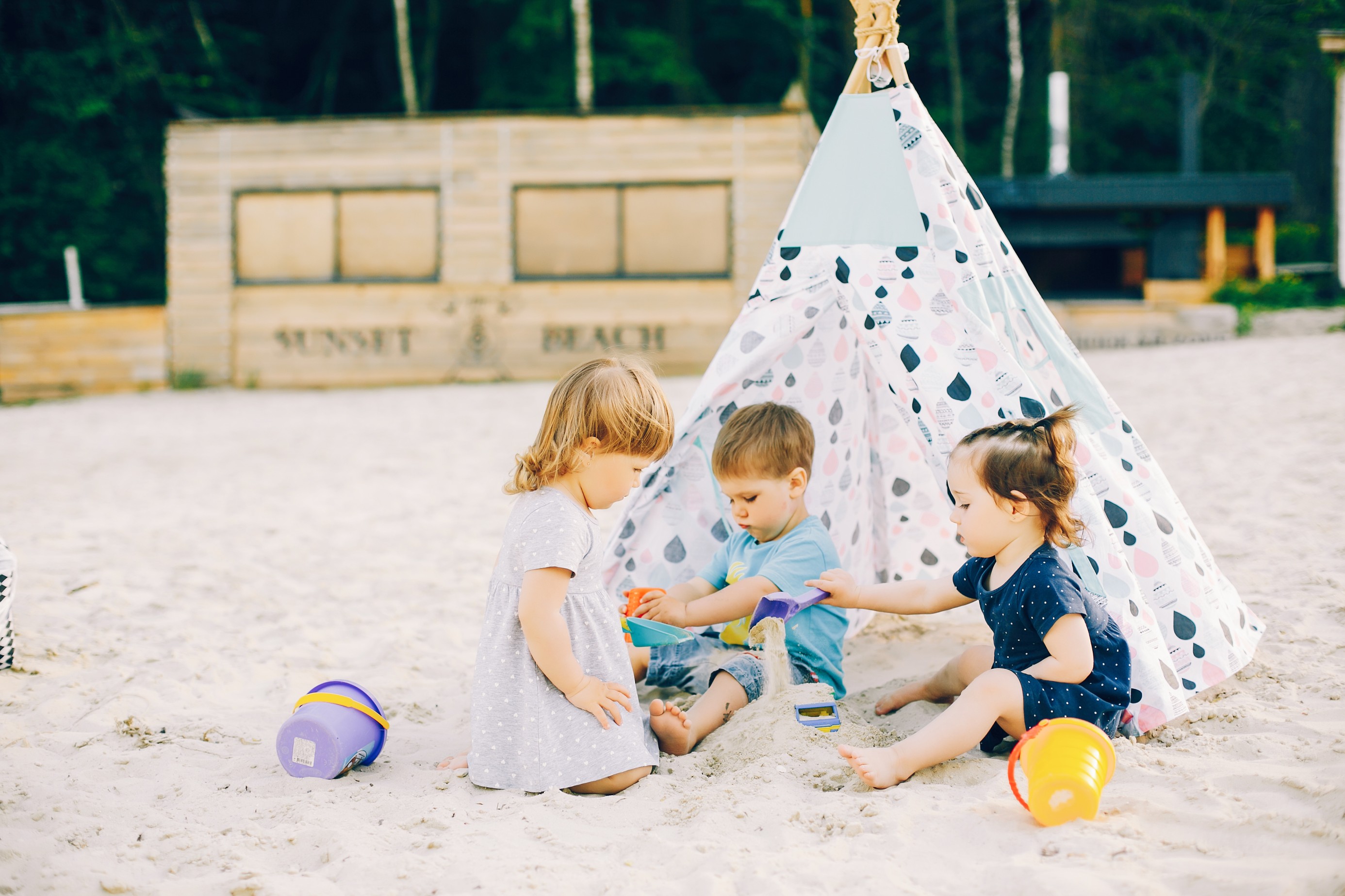 Children running and laughing on the outdoor play area