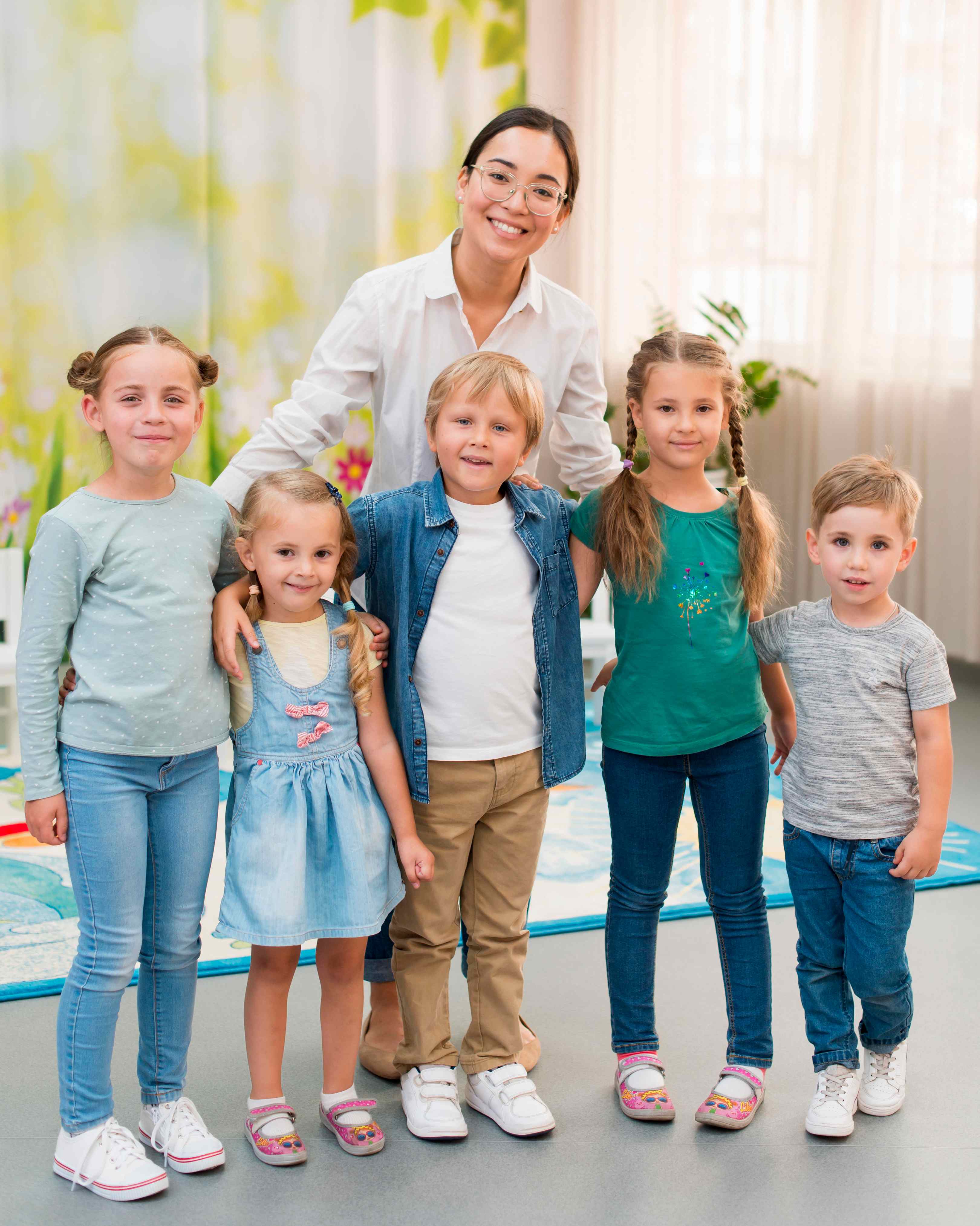 The Sprouting Munchkins teaching team smiling together